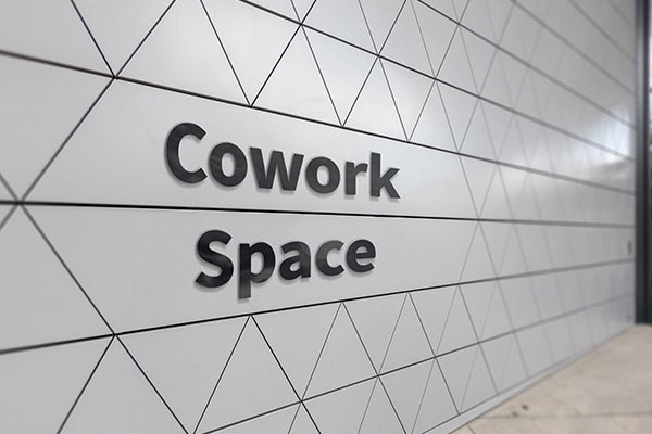 Cowork Space Viny Lobby Sign Designed by Igna Signs & Graphics Chicago