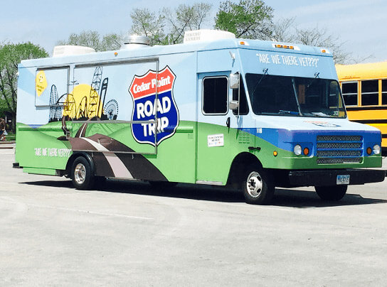 Cedar Road Trip Food Truck Wrap for Branding in Chicago, IL